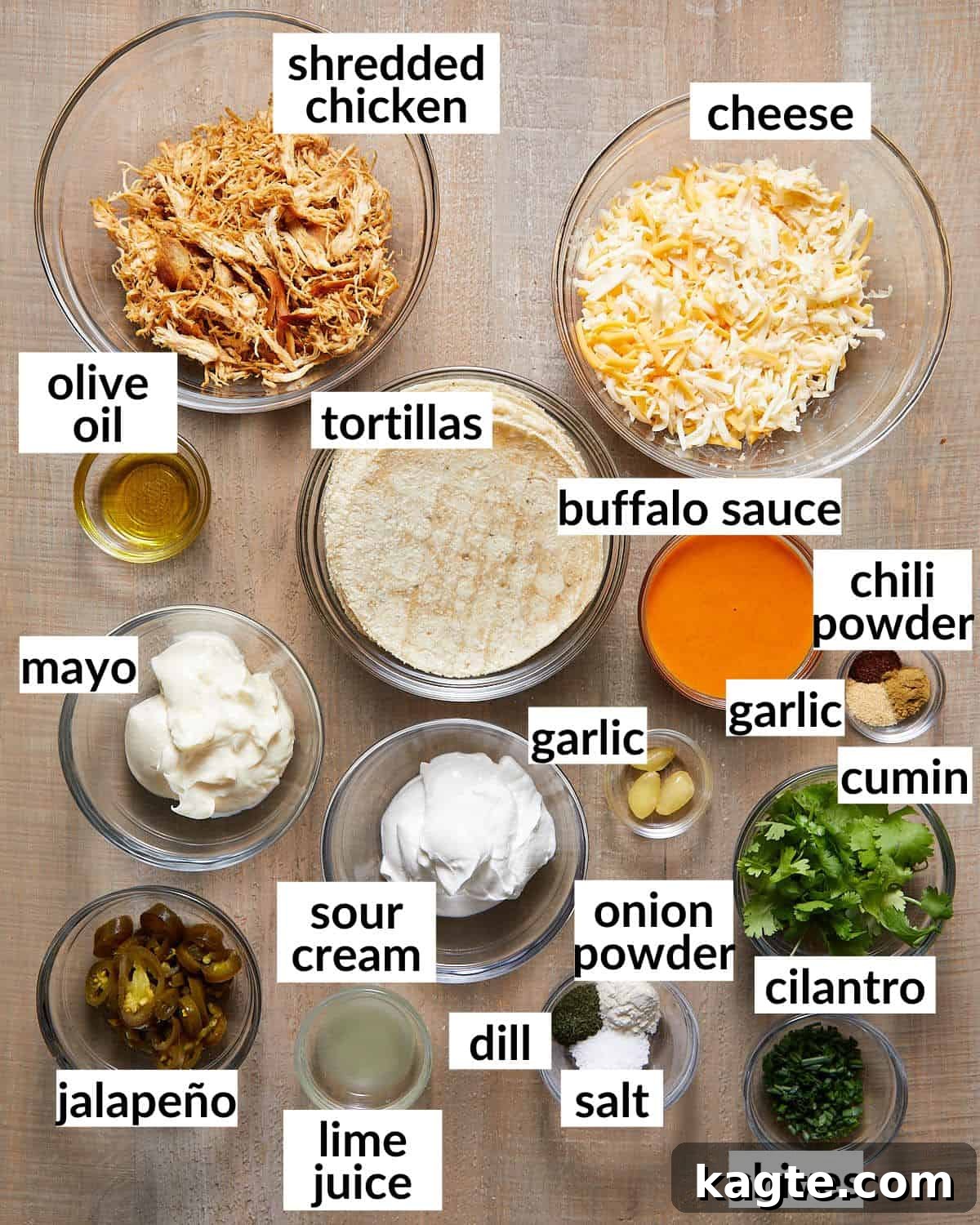 Ingredients needed to make buffalo chicken tacos in glass bowls.