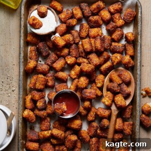 Deliciously crispy seasoned tater tots ready to eat.