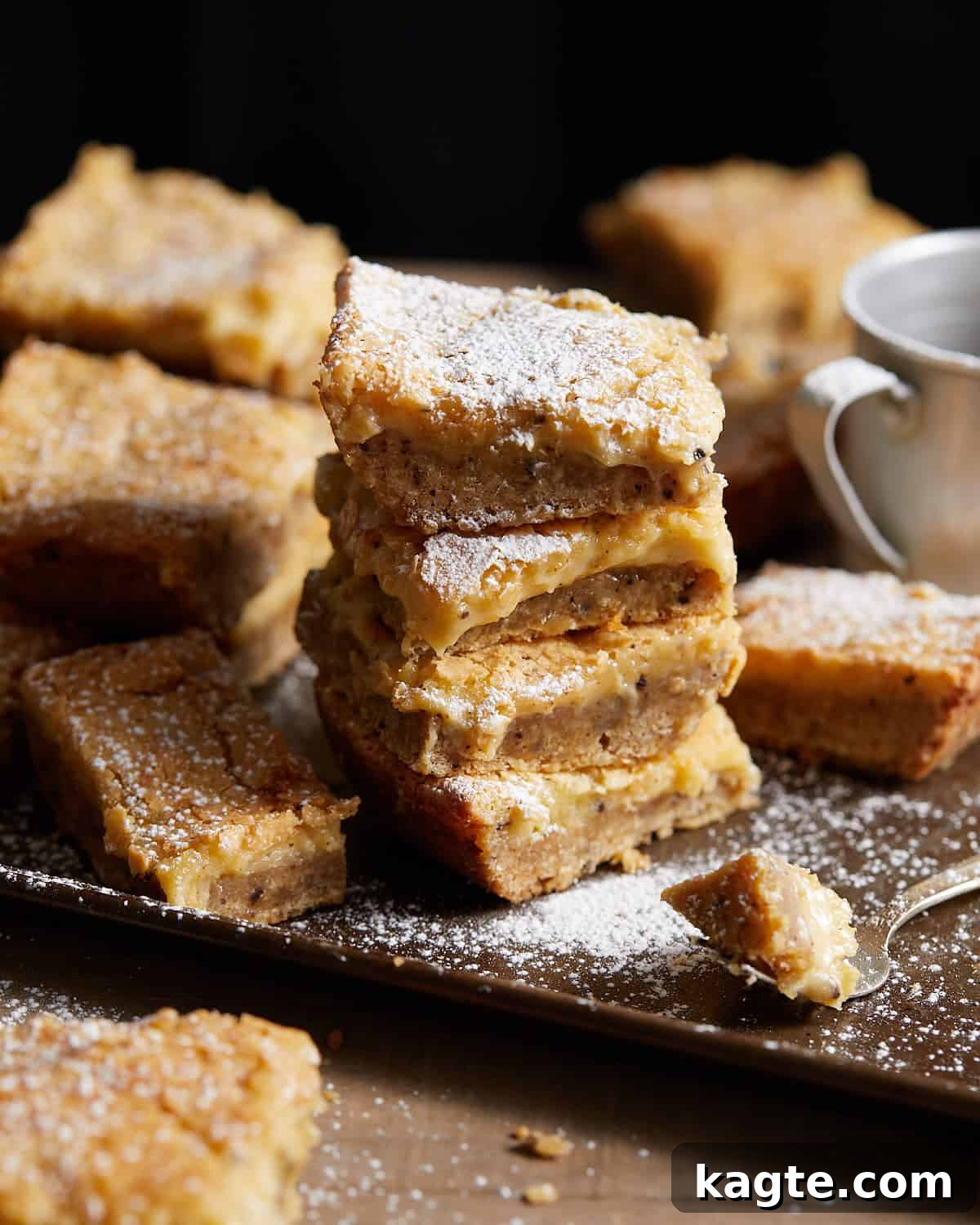 Irresistible Brown Butter Chess Squares 2 Image of stacked homemade brown butter chess squares, showcasing their gooey texture.