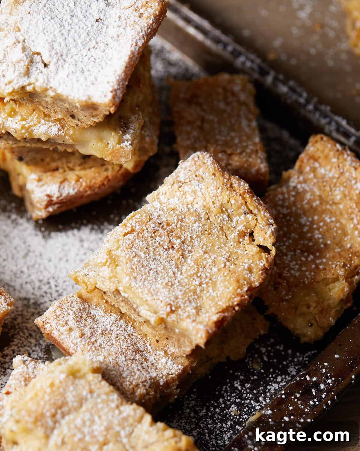 Irresistible Brown Butter Chess Squares 7 Up close image of golden brown butter chess squares with a soft, gooey center, showing the delicious texture.