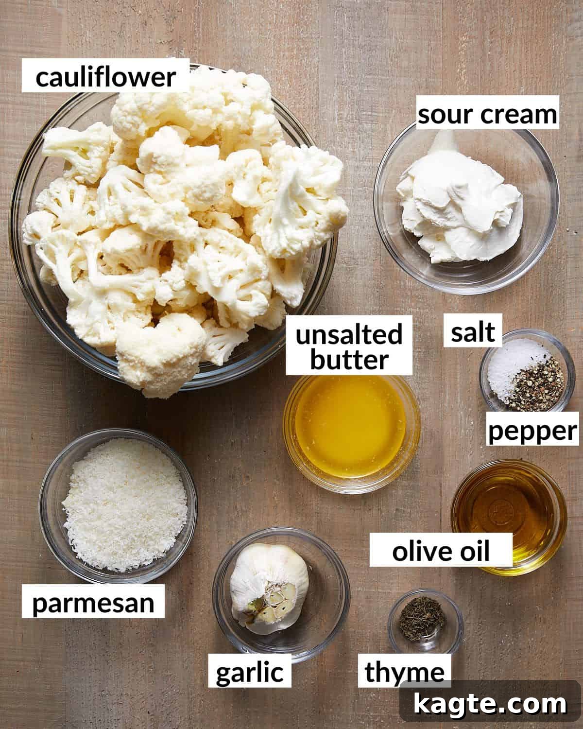 Creamy Roasted Cauliflower Puree 3 Overhead image showcasing all the fresh and essential ingredients required to prepare the roasted mashed cauliflower.