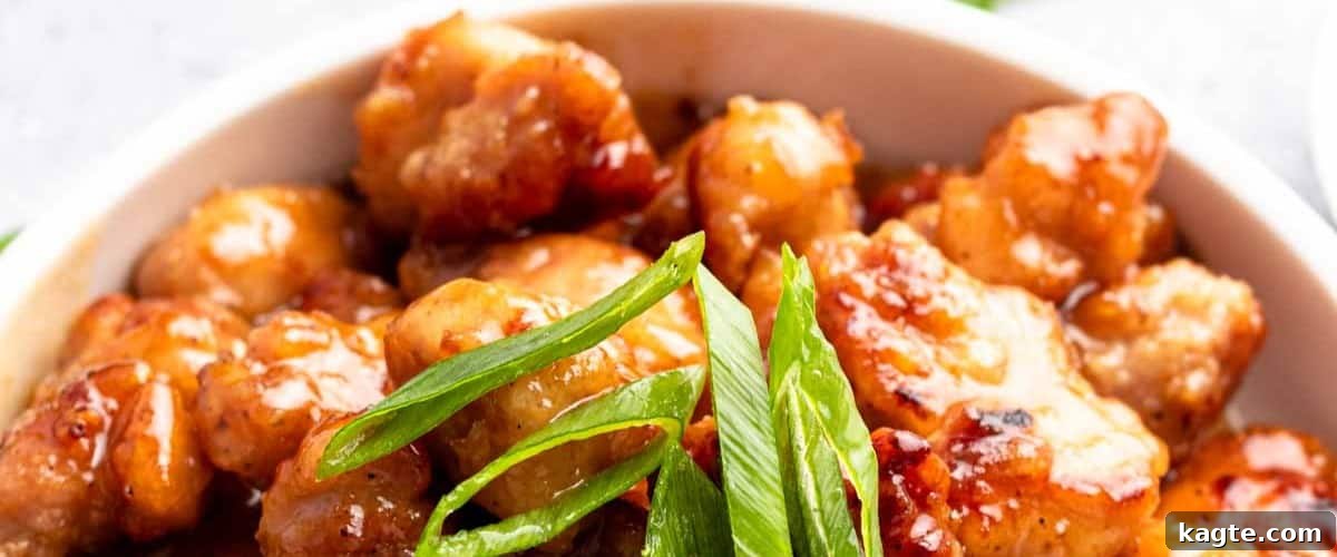 25 Hassle-Free Boneless Chicken Thigh Ideas 14 Golden-brown honey butter chicken, garnished and ready to be served.