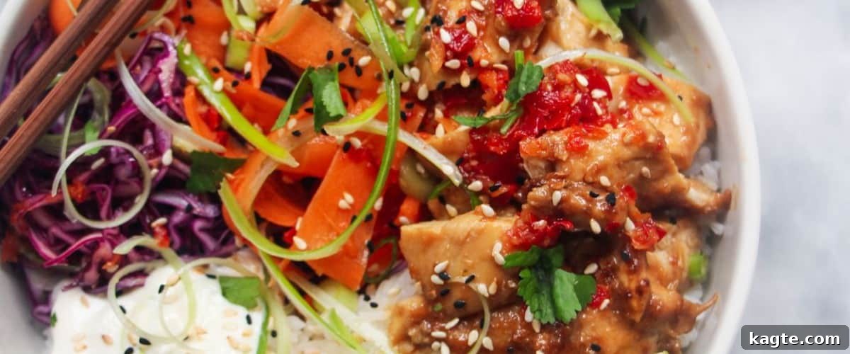 25 Hassle-Free Boneless Chicken Thigh Ideas 29 Colorful grilled chicken poke bowl, garnished with fresh ingredients.
