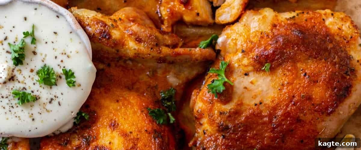 25 Hassle-Free Boneless Chicken Thigh Ideas 8 Flavorful baked buffalo chicken thighs, artfully arranged and garnished.