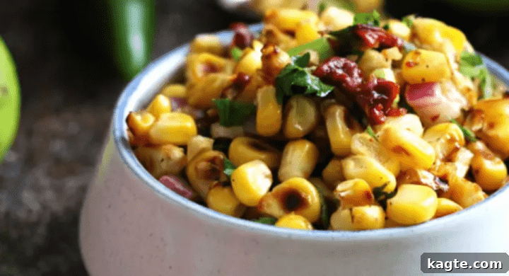 Elevate Your Fish Tacos 25 Perfect Side Dishes 5 A bowl of vibrant chipotle corn salsa with fresh herbs.