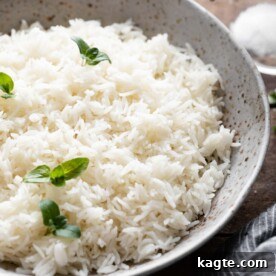 A close-up image of perfectly cooked, fluffy Basmati rice.