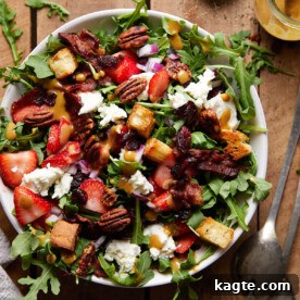 Close-up of a vibrant Goat Cheese Salad with Arugula, featuring fresh greens, crumbled goat cheese, and a light dressing.