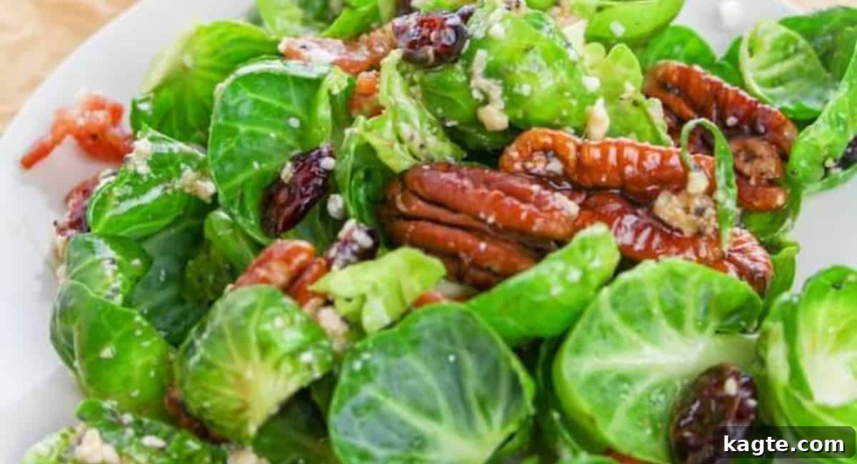 18 Delicious Side Dishes to Perfectly Complement Sea Bass 4 Up close image of a hearty Brussel Sprout Salad with bacon pieces and a light poppyseed vinaigrette.