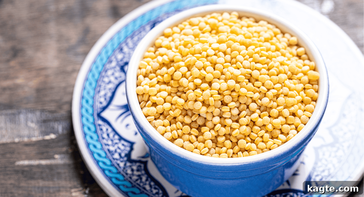 No Orzo? No Problem! 20 Clever Substitutes 14 Overhead image of israeli couscous in blue bowl.