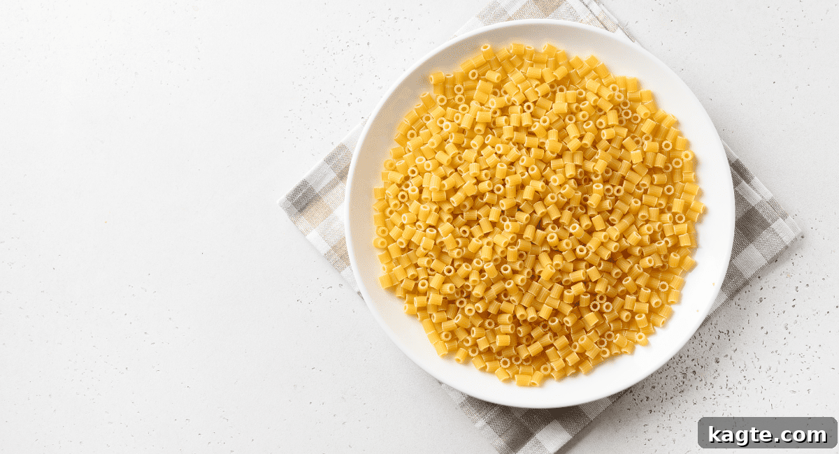 No Orzo? No Problem! 20 Clever Substitutes 19 Overhead image of ditalini pasta in white bowl.