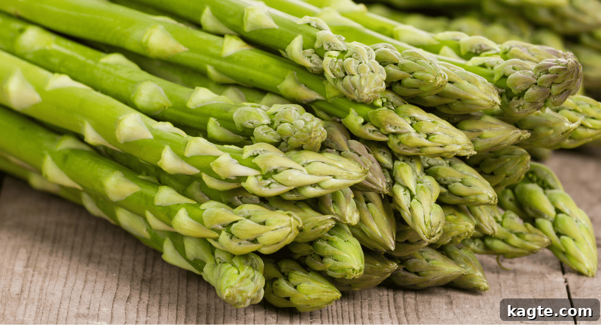 12 Savvy Celery Swaps 3 Close-up image of fresh, vibrant green asparagus spears, highlighting their tender tips and smooth texture.