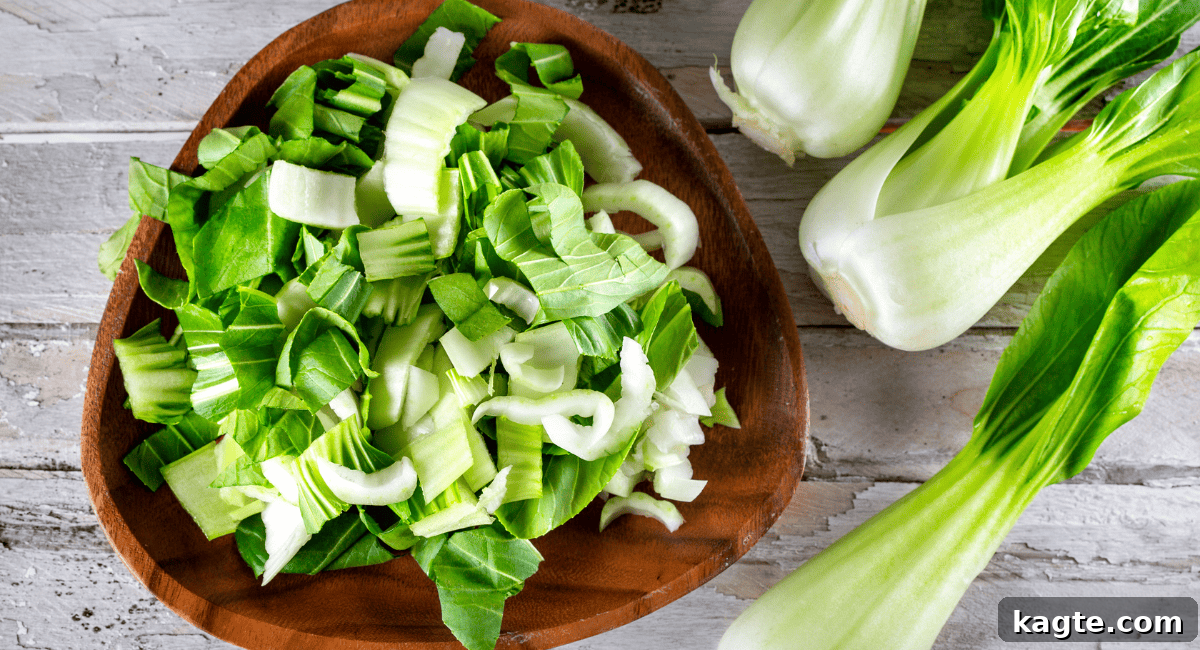 12 Savvy Celery Swaps 4 Fresh bok choy, displaying its crisp white stalks and dark green, crinkled leaves, often used in Asian cuisine.