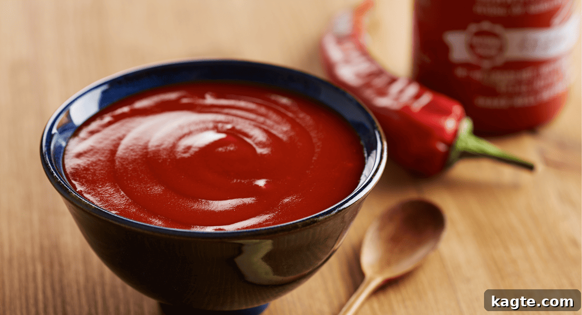 No Chili Oil? 8 Savvy Substitutes to Save Your Meal 10 Overhead image of sriracha sauce.