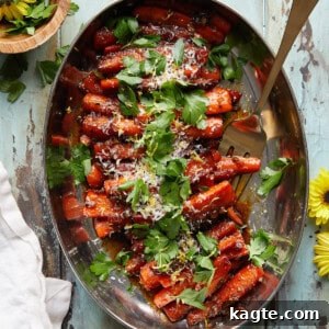 A serving of easy glazed stovetop carrots in a bowl, ready to be eaten.