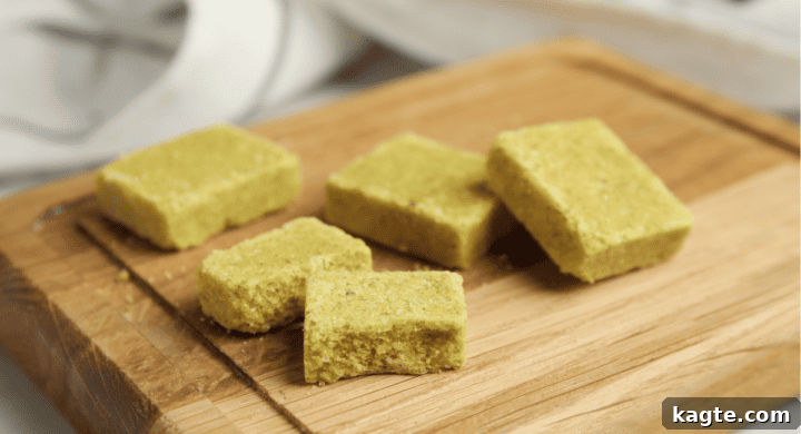 Several bouillon cubes on a kitchen surface.