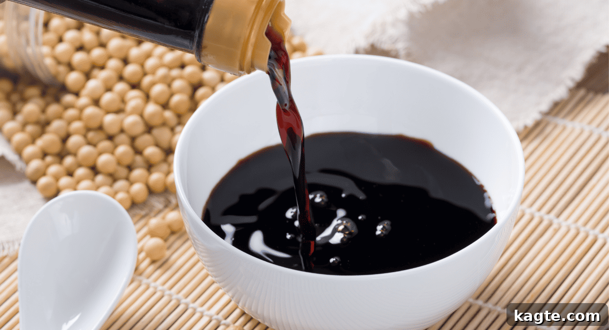 Up close image of soy sauce in white bowl.