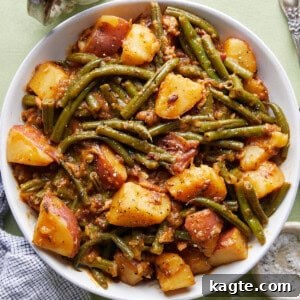 Close-up overhead shot of the finished Green Beans and Potatoes dish, ready to serve.
