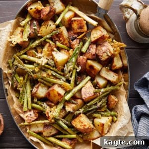 Roasted Potatoes and Asparagus with Parmesan, garnished and ready to eat.