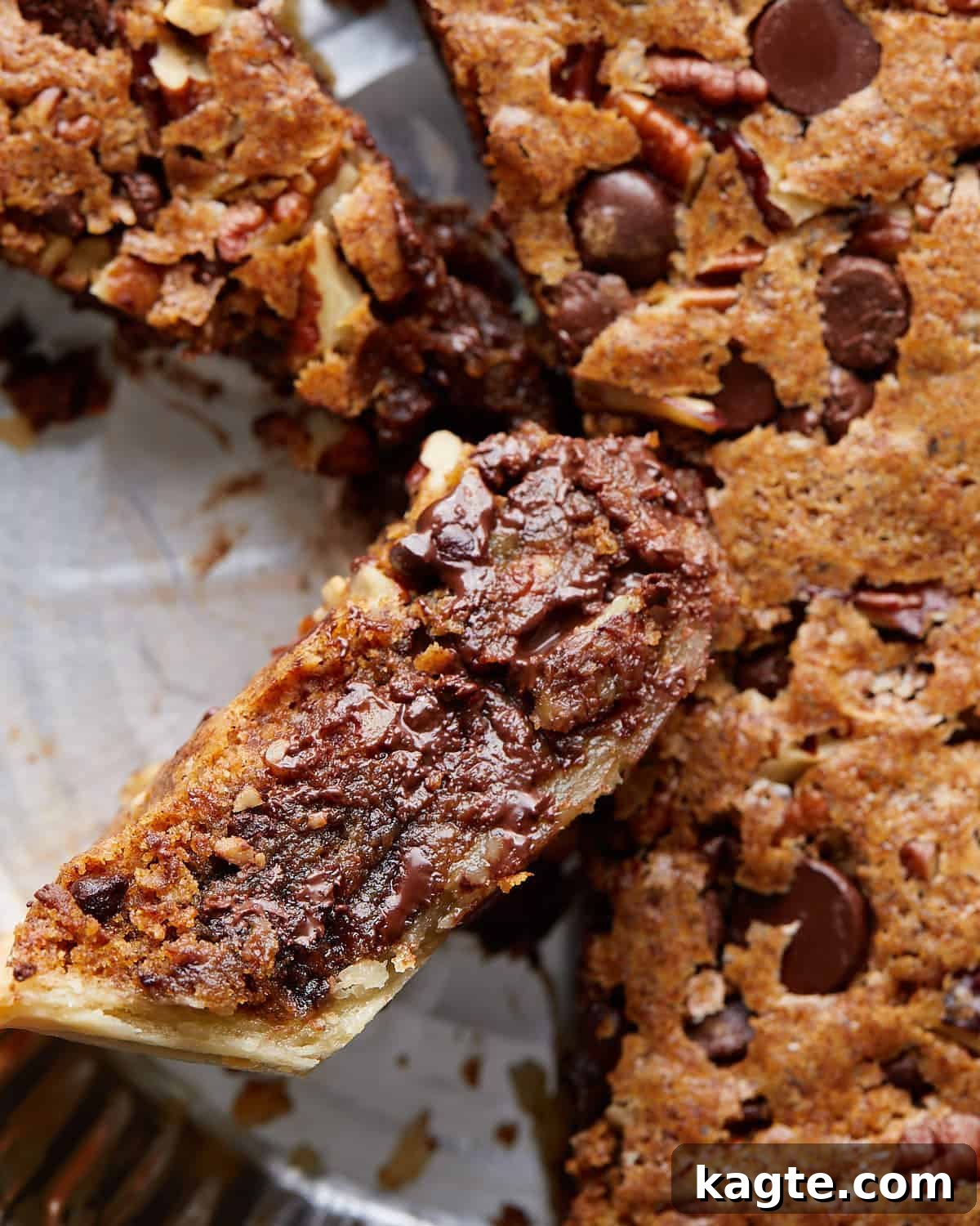 Decadent Gooey Chocolate Chip Cookie Pie 6 Up close image of chocolate chip cookie pie slice.