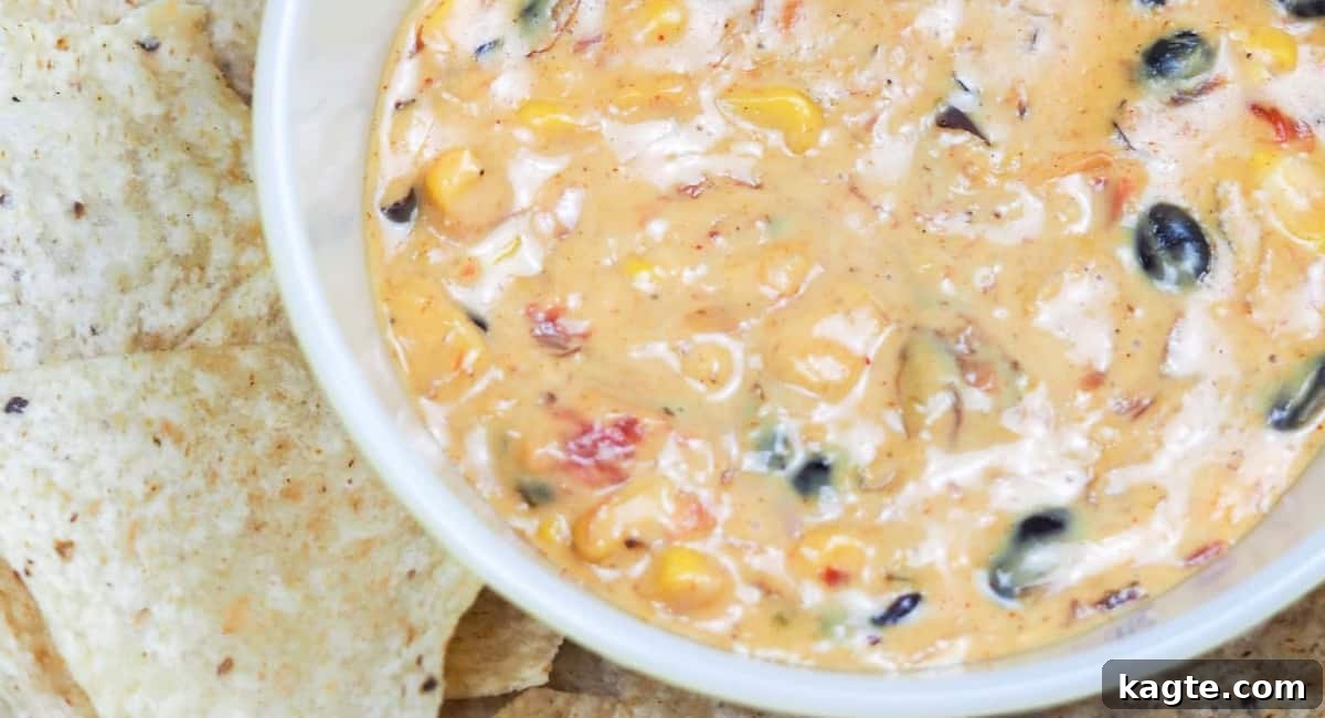 Overhead image of a bubbling Instant Pot BBQ Queso Dip.