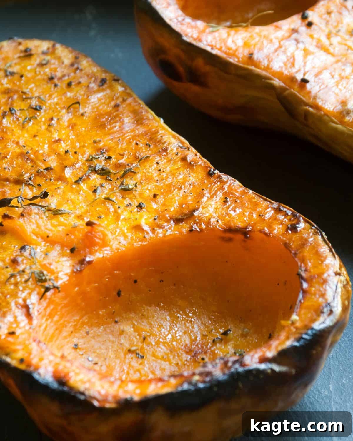 Perfectly Roasted Butternut Squash 5 A close-up image of the golden-brown, tender flesh of baked butternut squash, highlighting its appealing texture.