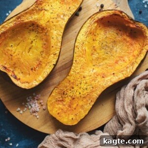 Beautifully baked butternut squash halves, ready for serving.