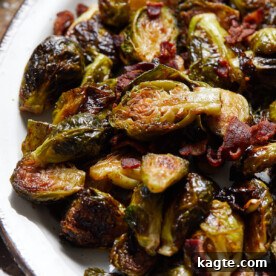 Close-up of perfectly roasted and glazed Brussels sprouts, showcasing their caramelized edges.
