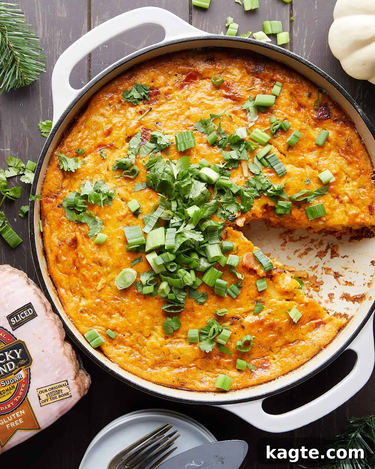 Make-Ahead Ham and Cheese Hash Brown Breakfast Bake 2 Overhead image of ham and cheese hash brown casserole with garnish.