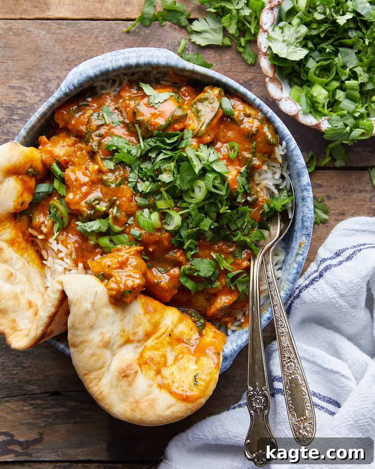 Nourishing Coconut Chicken Curry 2 Overhead image of healthy chicken curry with garnish.