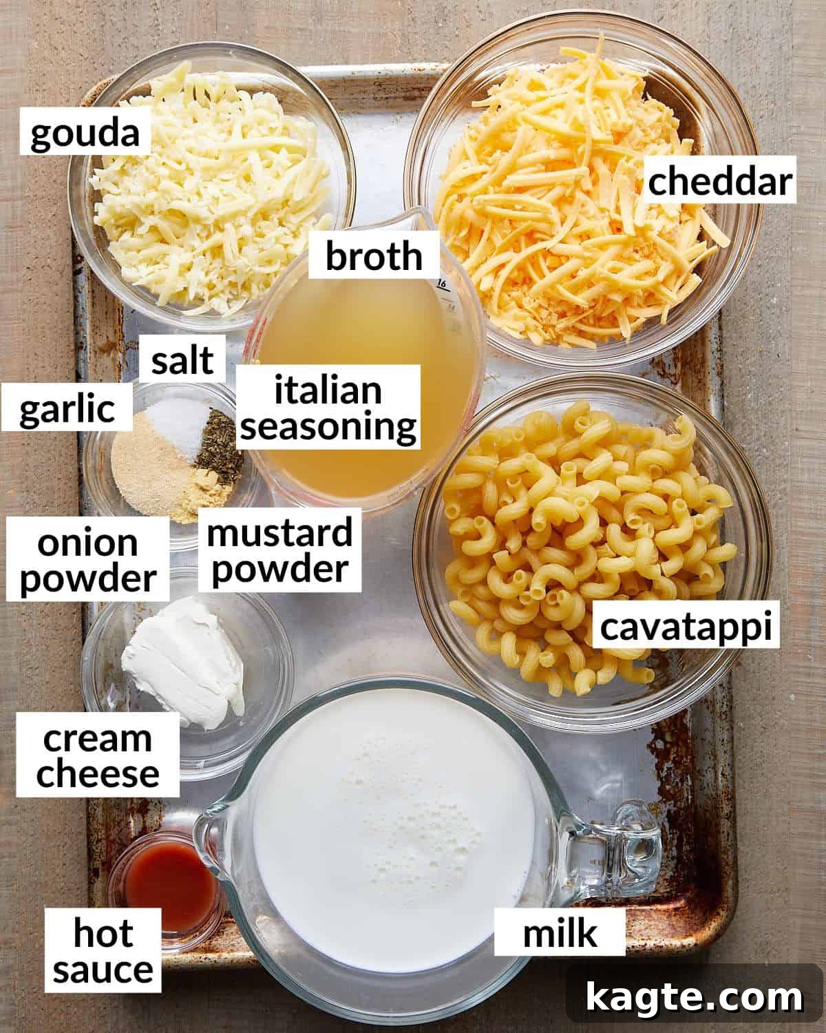 Overhead image of ingredients needed to make Dutch oven mac and cheese, neatly arranged.