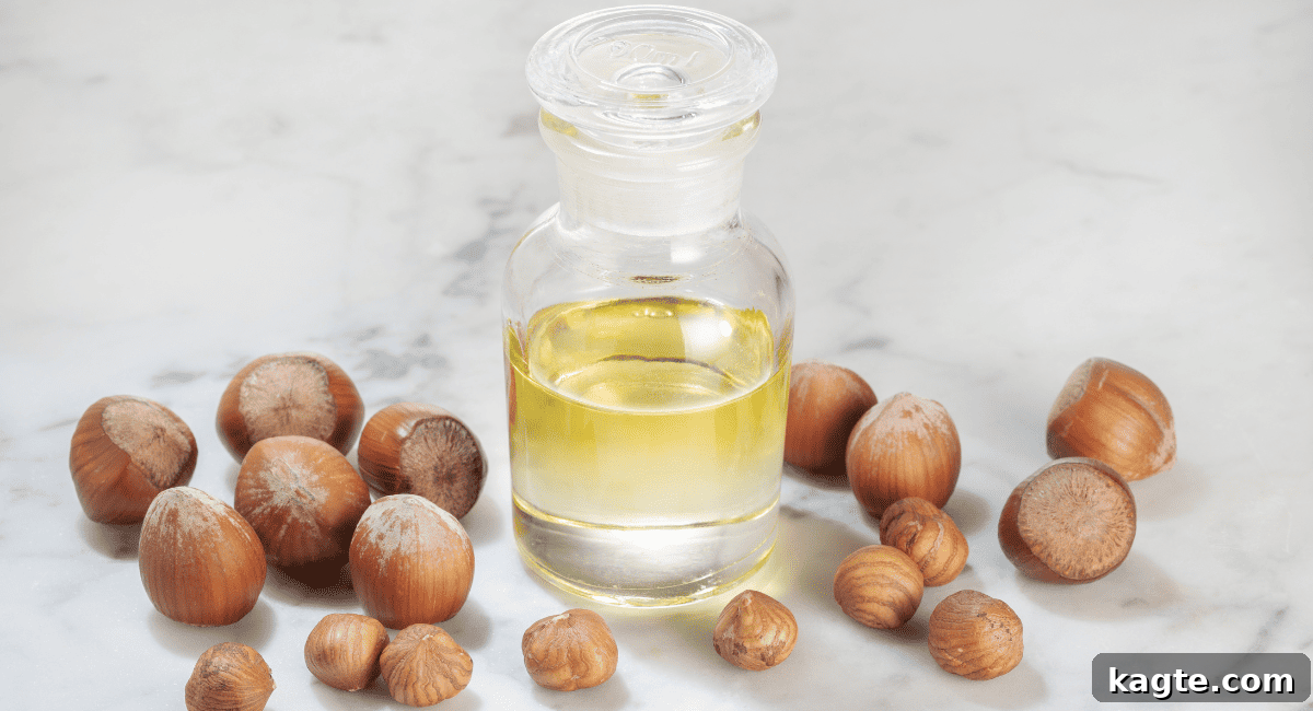 10 Smart Swaps for Avocado Oil 8 A bottle of hazelnut oil next to fresh hazelnuts.