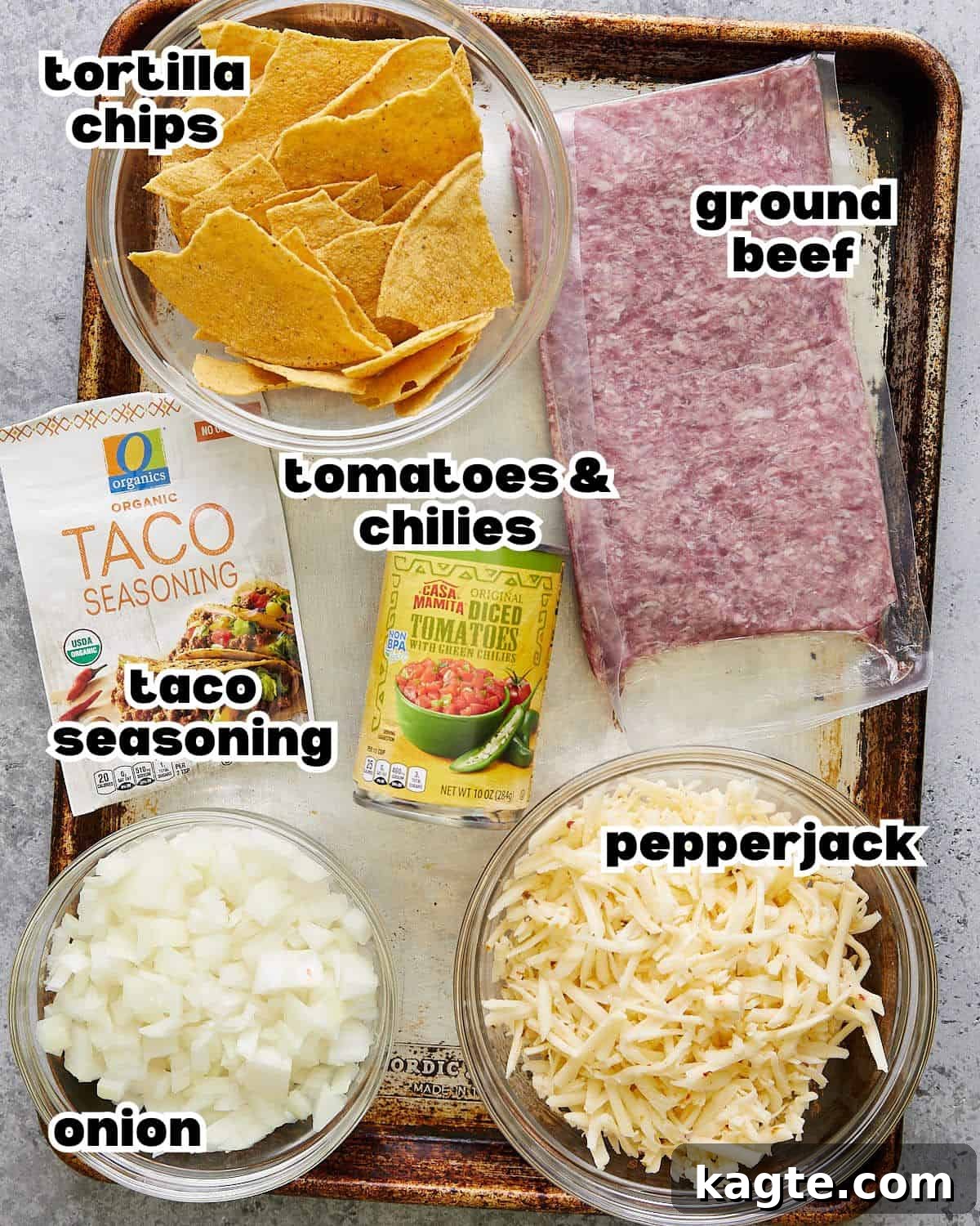 Simple Crispy Beef Taco Bake 3 Overhead image of ingredients needed to make beef taco casserole, neatly arranged.