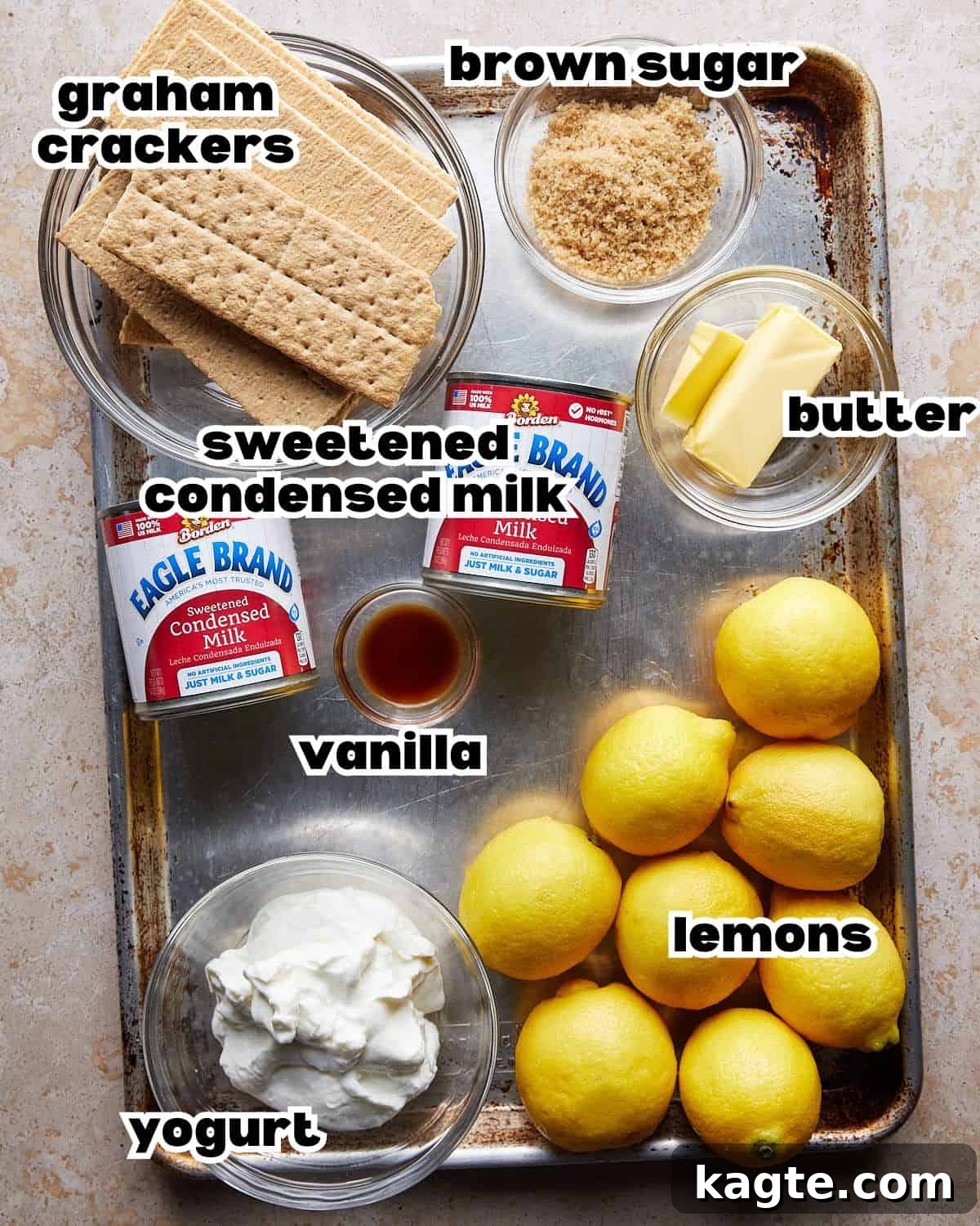 Zesty Lemon Bars With Graham Cracker And Condensed Milk Perfection 3 Overhead image of ingredients needed to make lemon bars with graham cracker crust.