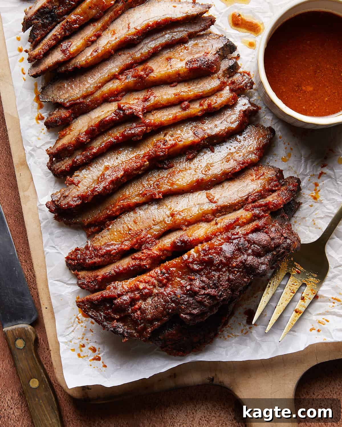 Overhead image of oven baked brisket with sauce.