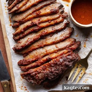 Oven Baked Brisket with sauce and herbs.