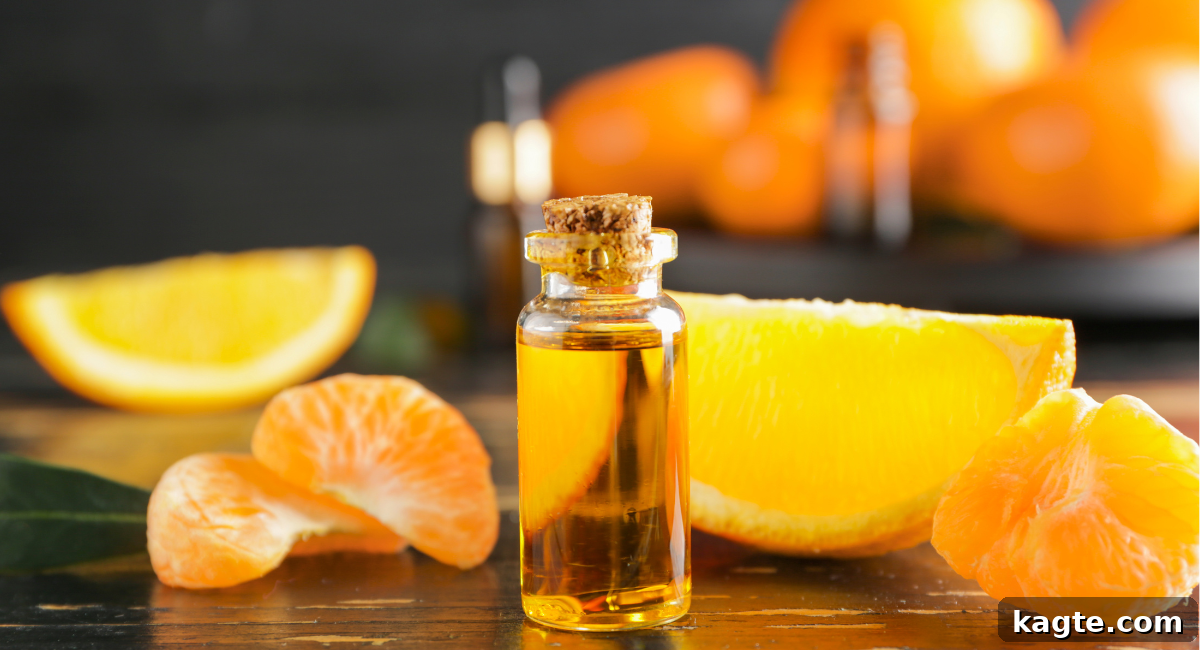 Top 12 Orange Juice Substitutes for Cooking and Baking 12 Close-up image of a small bottle of clear orange extract liquid next to a fresh, vibrant orange, symbolizing concentrated flavor.