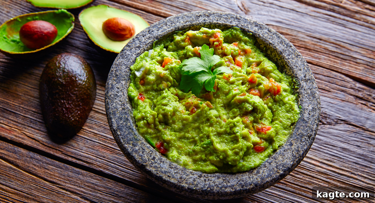 Quick & Delicious 20 Fish Taco Topping Ideas 6 Overhead image of guacamole with garnish.