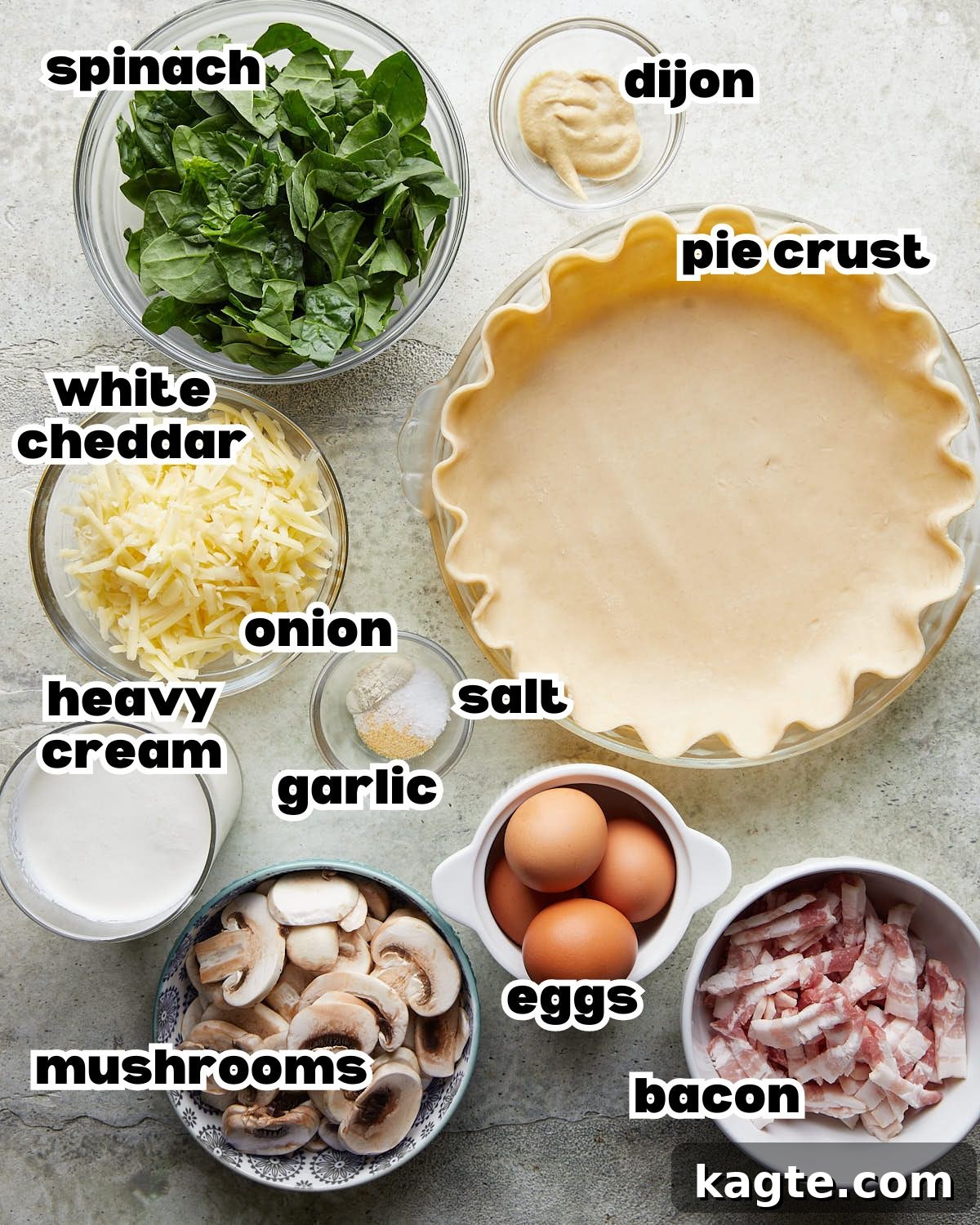 Golden Bacon, Spinach, and Mushroom Quiche with Sharp Cheddar 3 A vibrant display of fresh ingredients: eggs, heavy cream, spinach, mushrooms, bacon, cheese, and Dijon mustard.