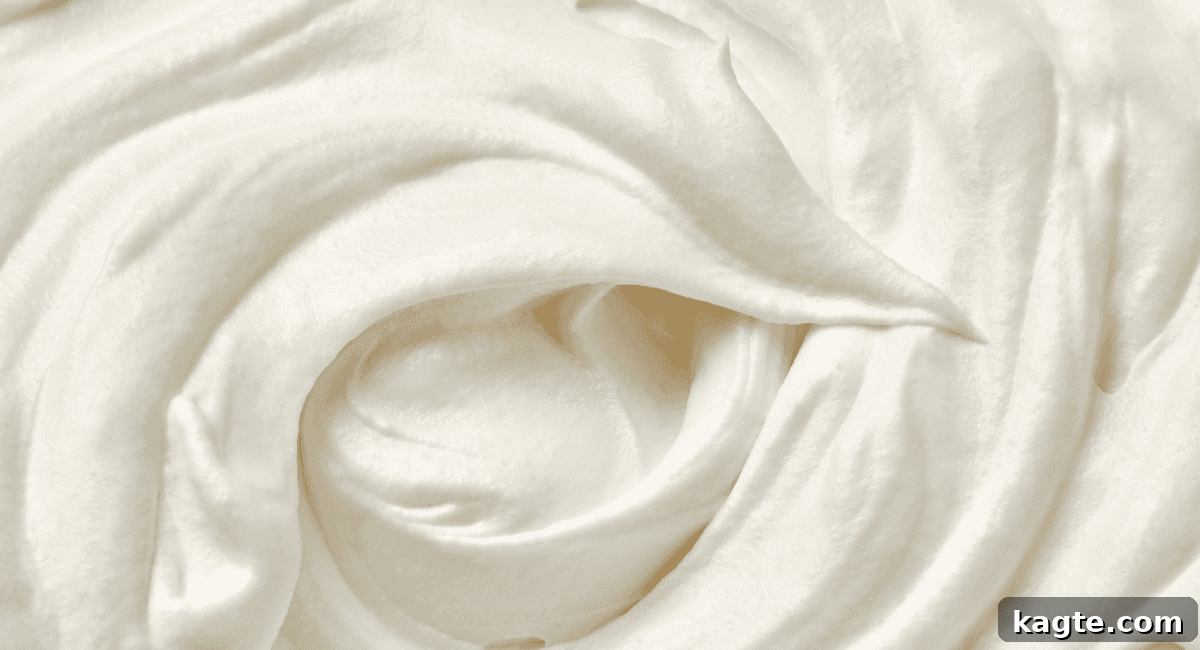 Design Your Own Sundae Bar 7 Overhead image of a large bowl of fluffy whipped cream ready to be served.