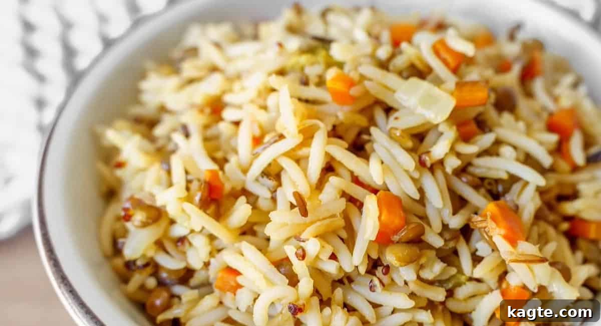 20 Perfect Sides for Chicken Cutlets 3 Overhead shot of a fluffy Instant Pot Wild Rice Blend with visible herbs and vegetables.