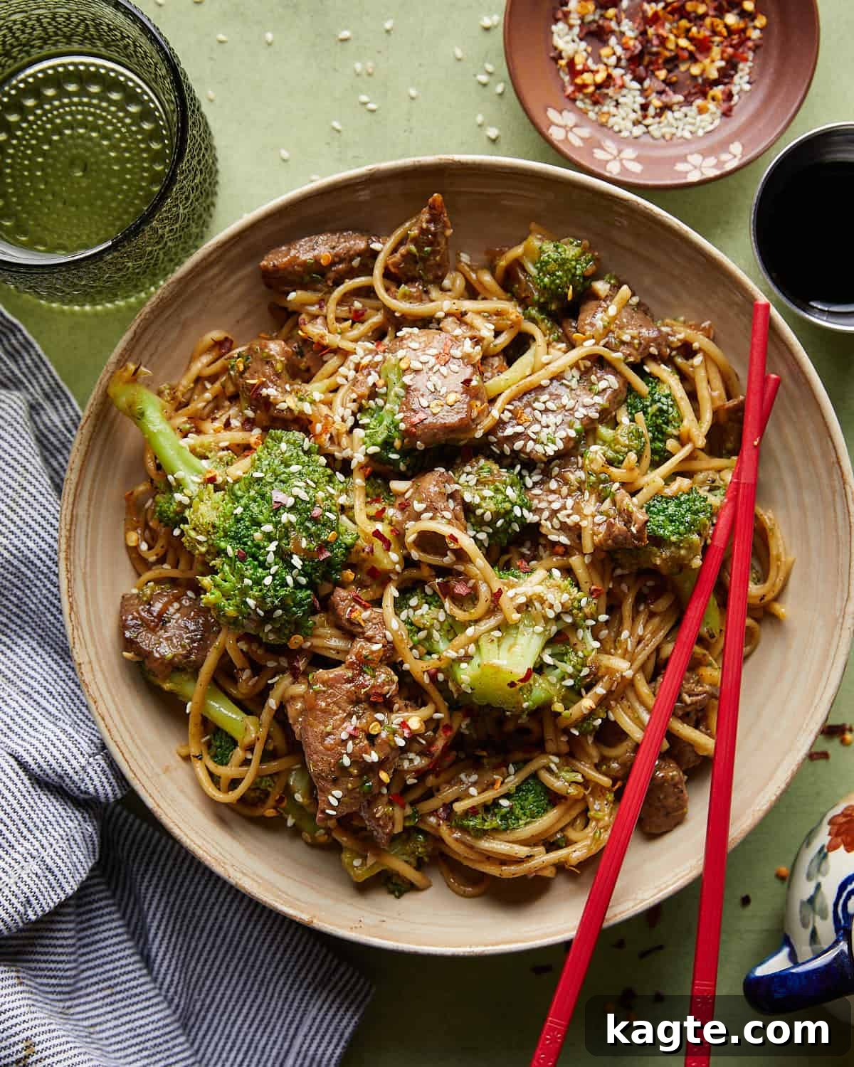 A vibrant bowl of Beef and Broccoli Noodles, showcasing tender beef, bright green broccoli, and savory noodles coated in a rich sauce.