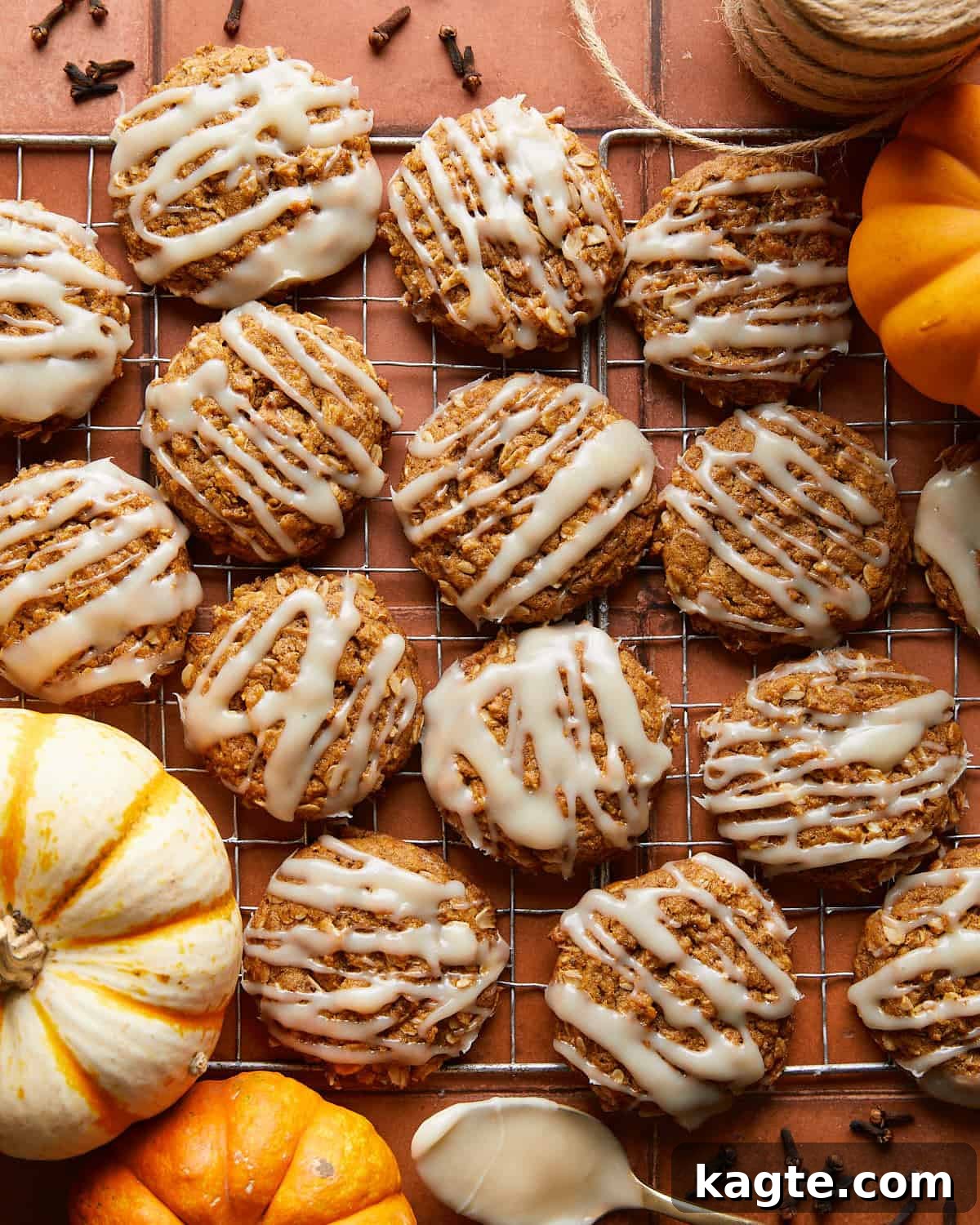 Spiced Chewy Pumpkin Oat Cookies 2 Overhead image of chewy pumpkin oatmeal cookies with cream cheese glaze, perfect for fall.