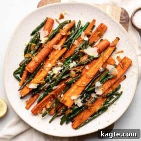 A smaller image of roasted green beans and carrots.