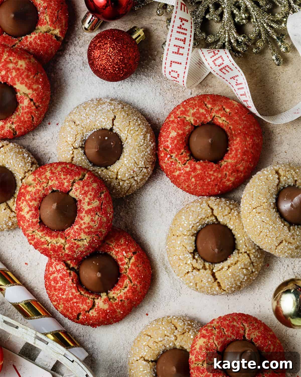 Festive Peanut Butter Blossoms 2 Overhead image of Christmas peanut butter blossoms with Christmas decor surrounding.