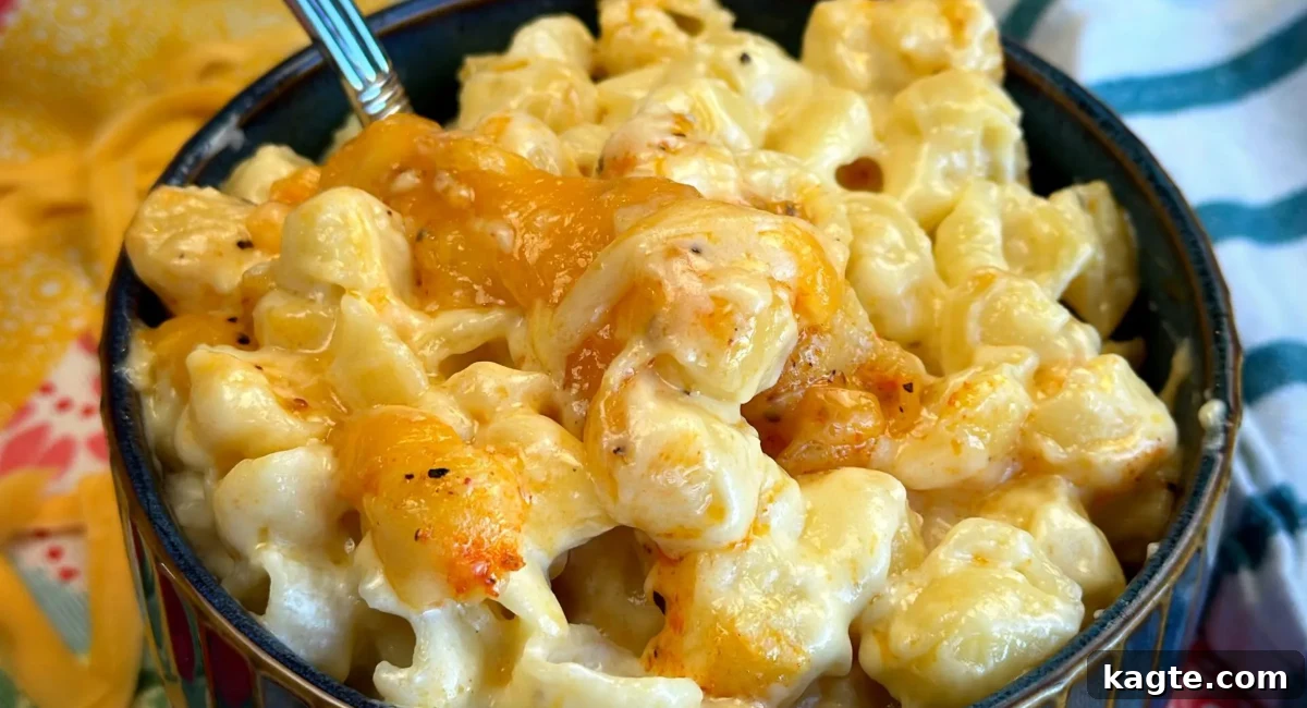 Overhead image of rich, smoky mac and cheese in a baking dish, with a perfectly browned top.