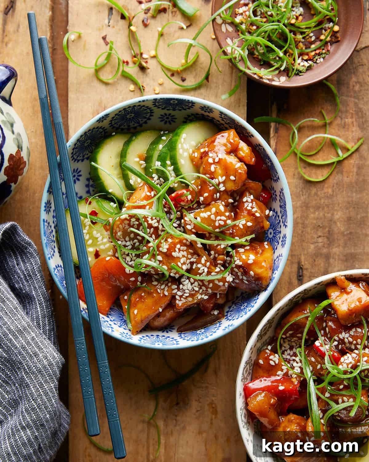 Overhead image of pineapple teriyaki chicken with garnish. 
