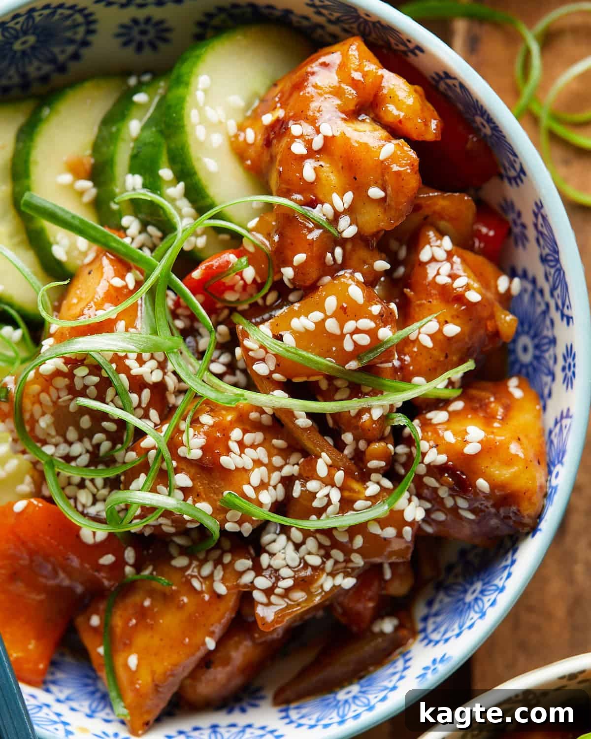Overhead image of pineapple teriyaki chicken with garnish. 