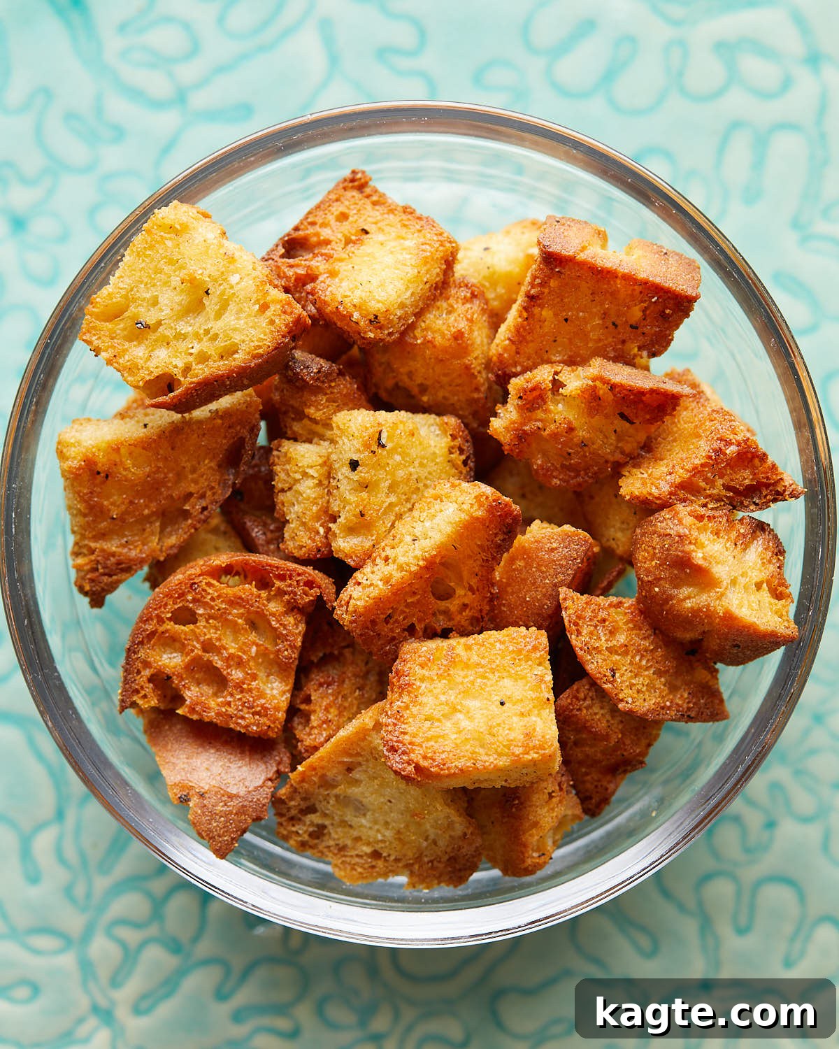 Perfectly Crispy Air Fryer Croutons 5 Overhead image of air fryer croutons in clear bowl.