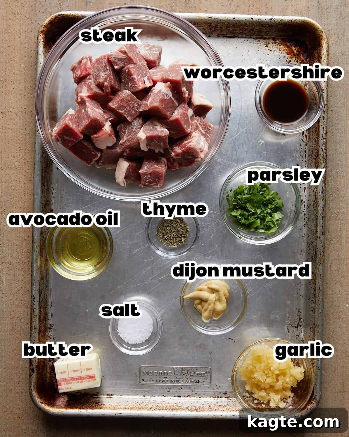 Succulent Garlic Butter Steak Bites 3 Overhead image of ingredients needed to make garlic butter steak bites.