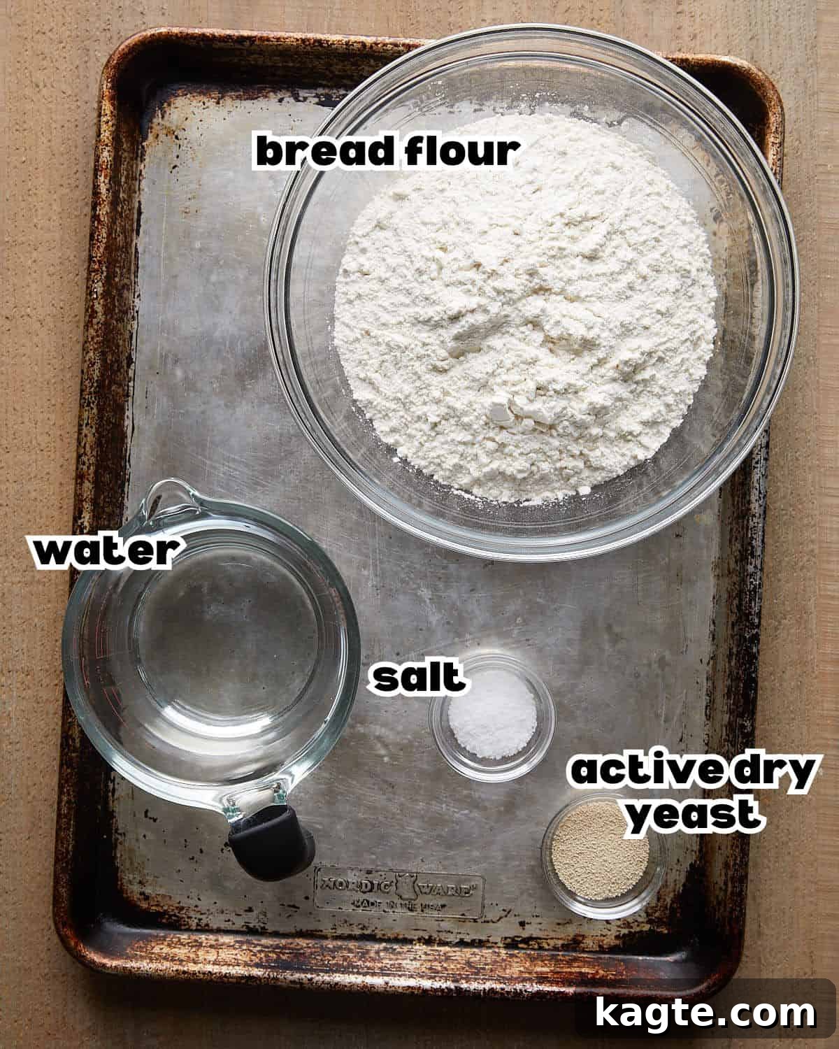 Perfectly Crusty Homemade French Bread 3 Overhead image of ingredients needed for french bread recipe.